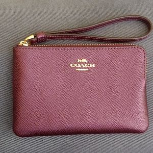 Coach wristlet metallic purple